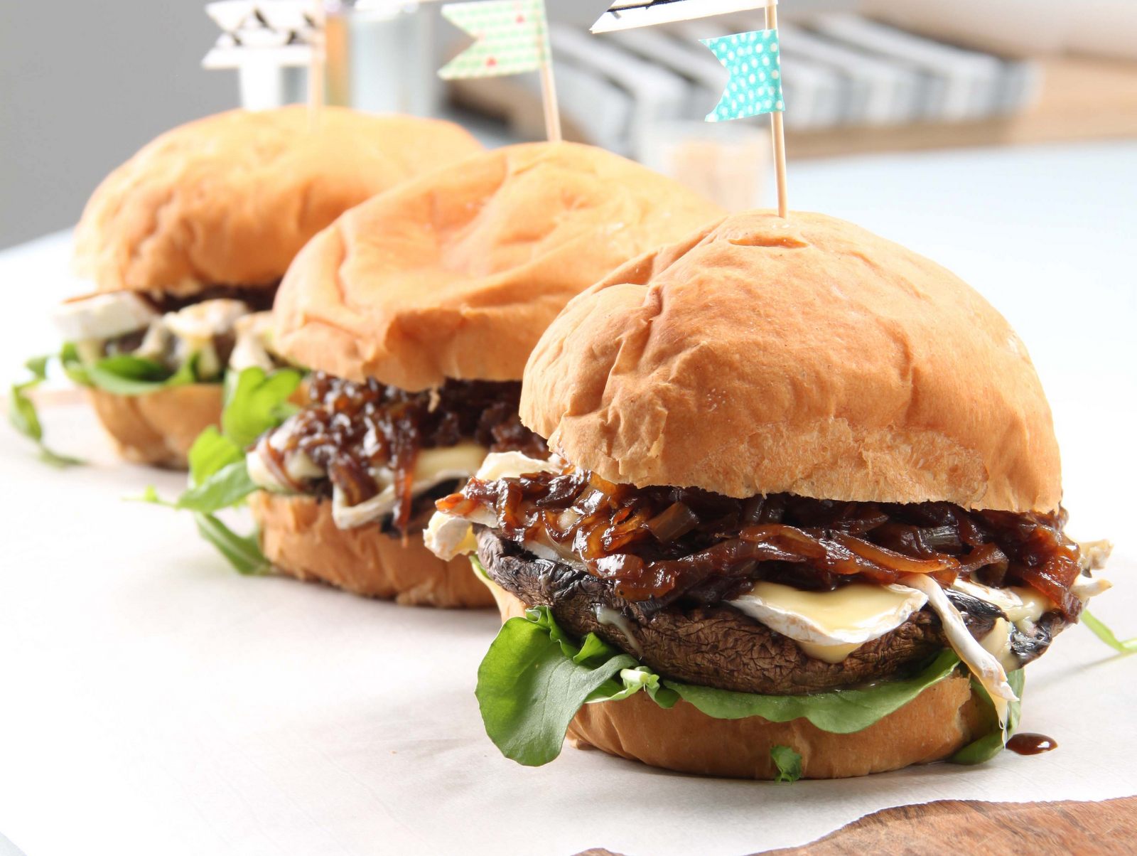 Giant mushroom burgers with caramelized onions 