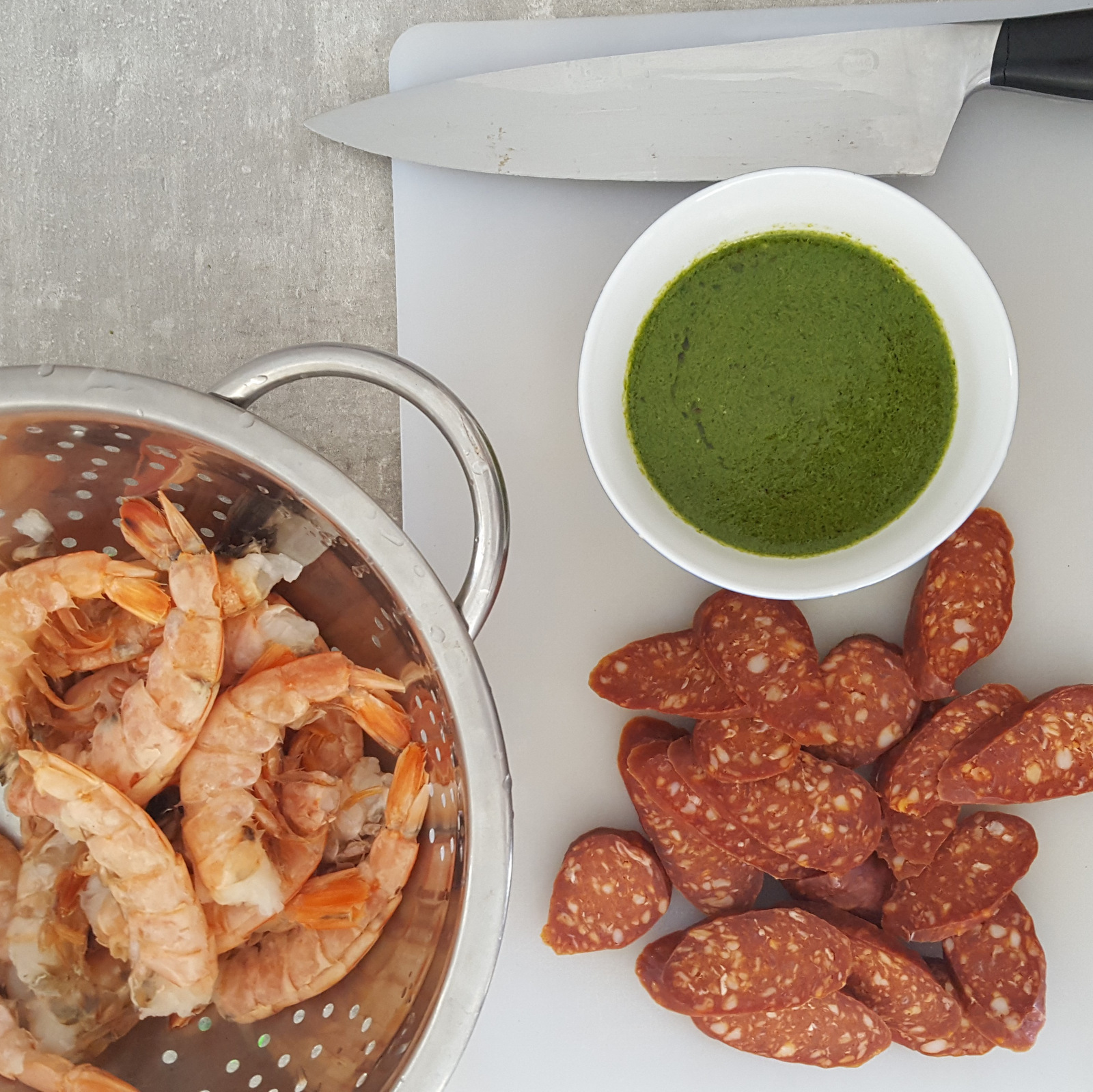 Pan-fried prawns with chorizo & chimichurri sauce cooked in an AMC Paella Pan