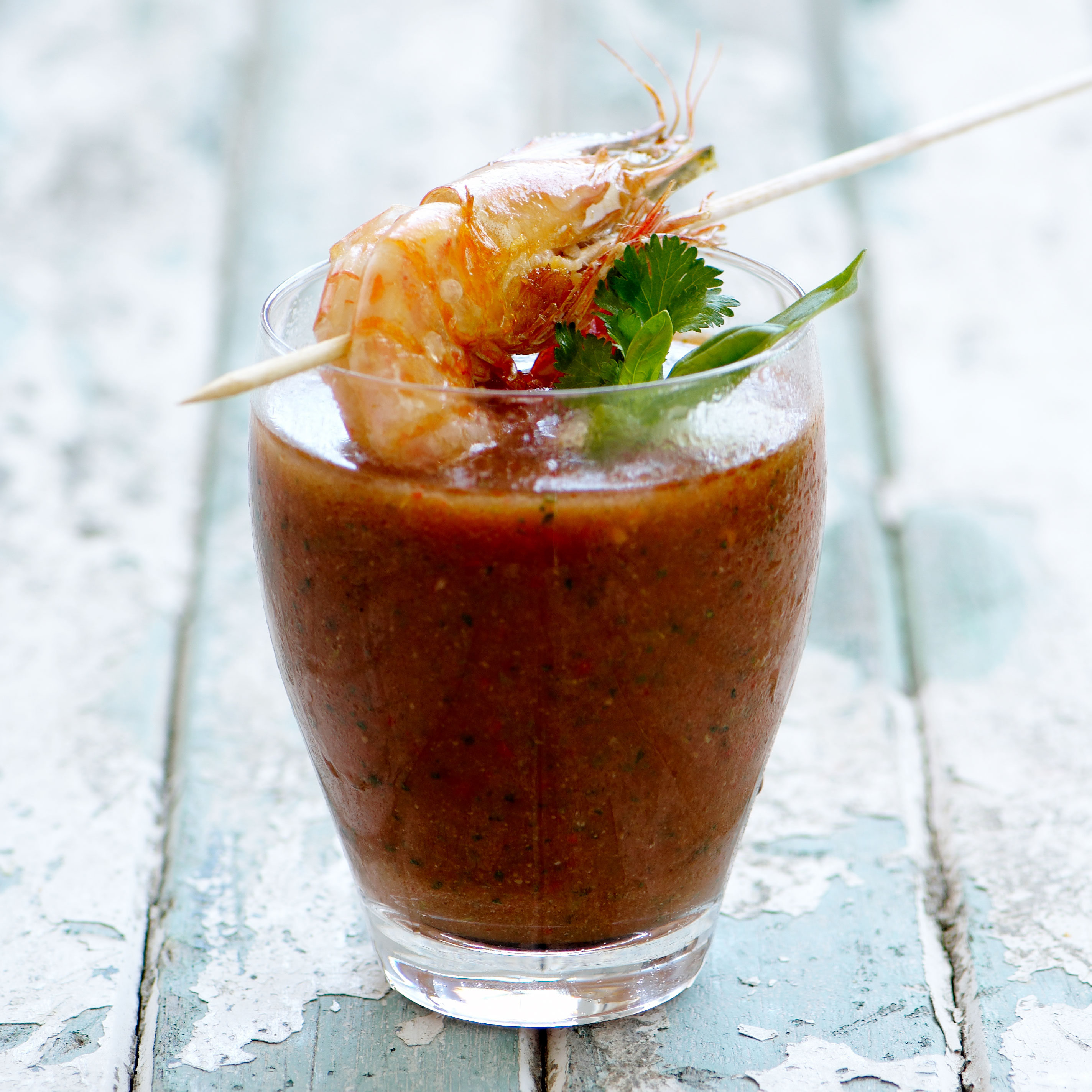 Gazpacho in glass topped with prawn
