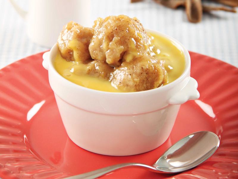 Cinnamon dumplings with orange sauce prepared in AMC Cookware