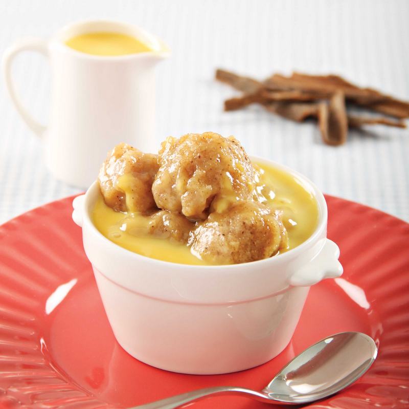 Cinnamon dumplings with orange sauce prepared in AMC Cookware