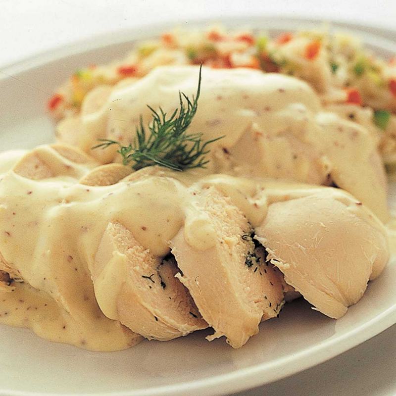 Poached chicken fillets with a mustard sauce