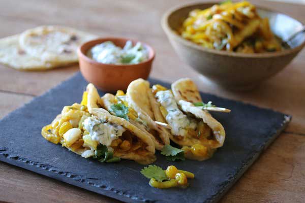 cape malay pickled fish with roti tacos