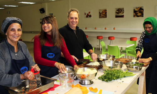 AMC Staff preparing soup
